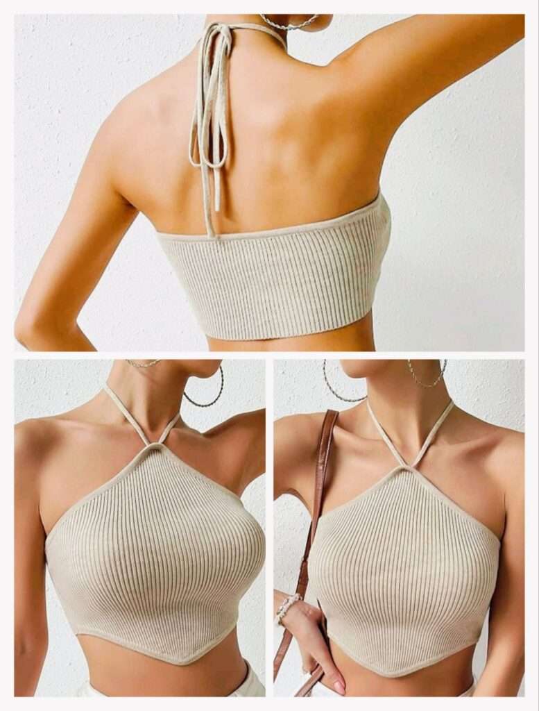 Close-up of beige halter neckline and pleated skirt fabric texture in a neutral summer outfit.